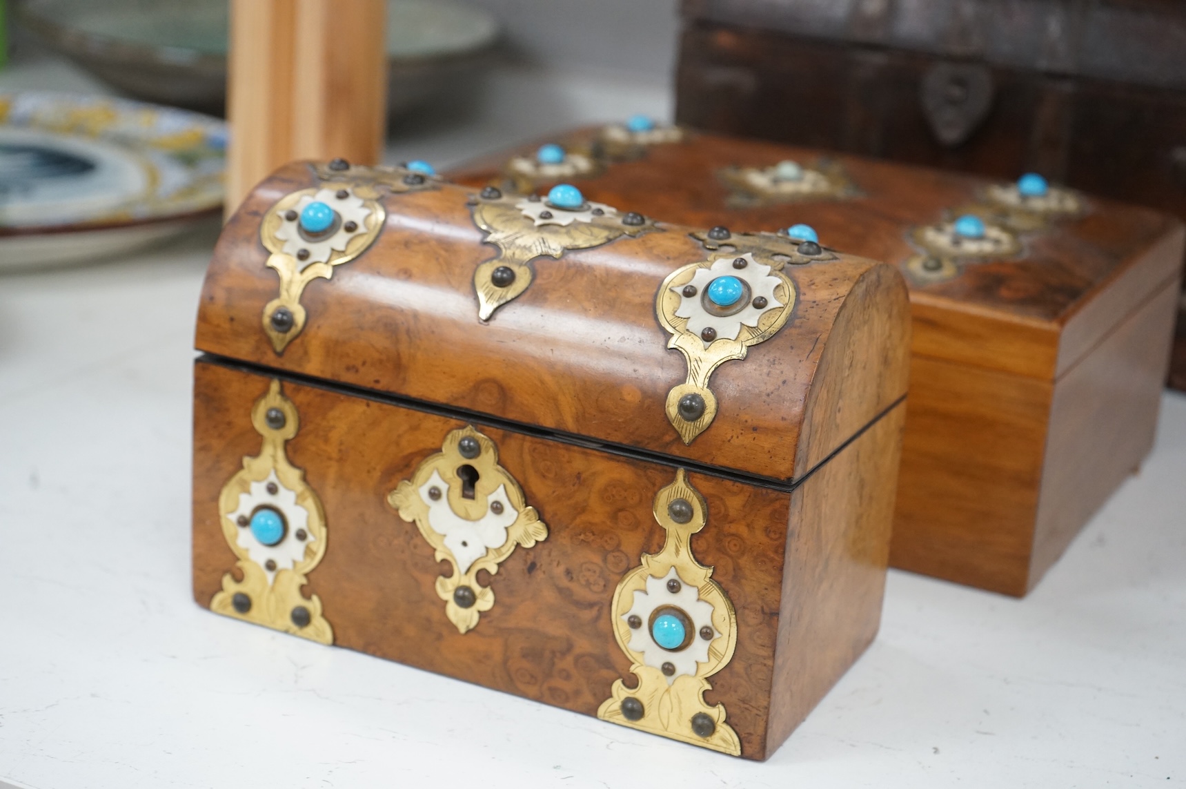 Two 19th century ivory and turquoise glass overlaid burr walnut boxes and an Indo colonial wrought iron mounted miniature chest, 28cm wide CITES Submission reference, T14WQFY5